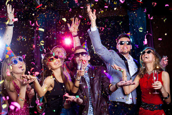 Party with shiny confetti and sunglasses